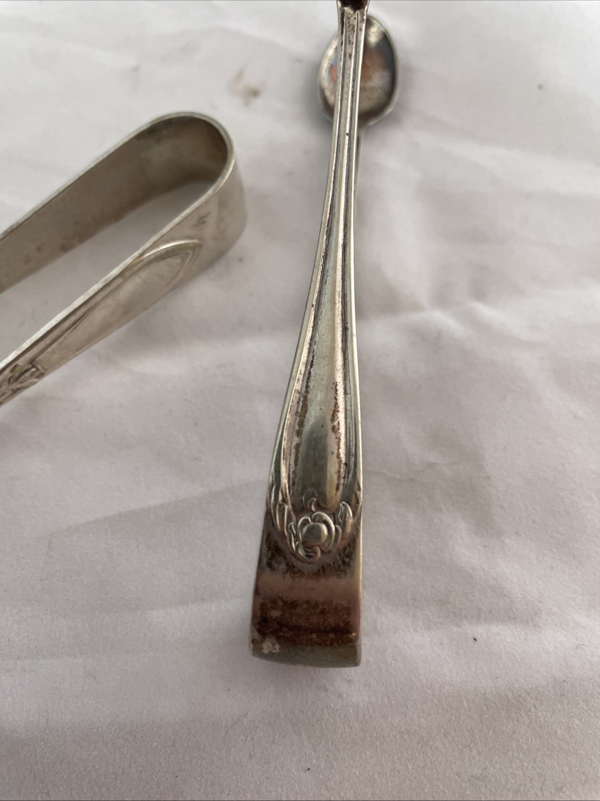silver plated sugar tongs X 2. Art Deco.