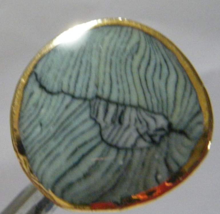 VTG Button ceramic with marbled center and gold tone rim metal shank 1 ” diam.