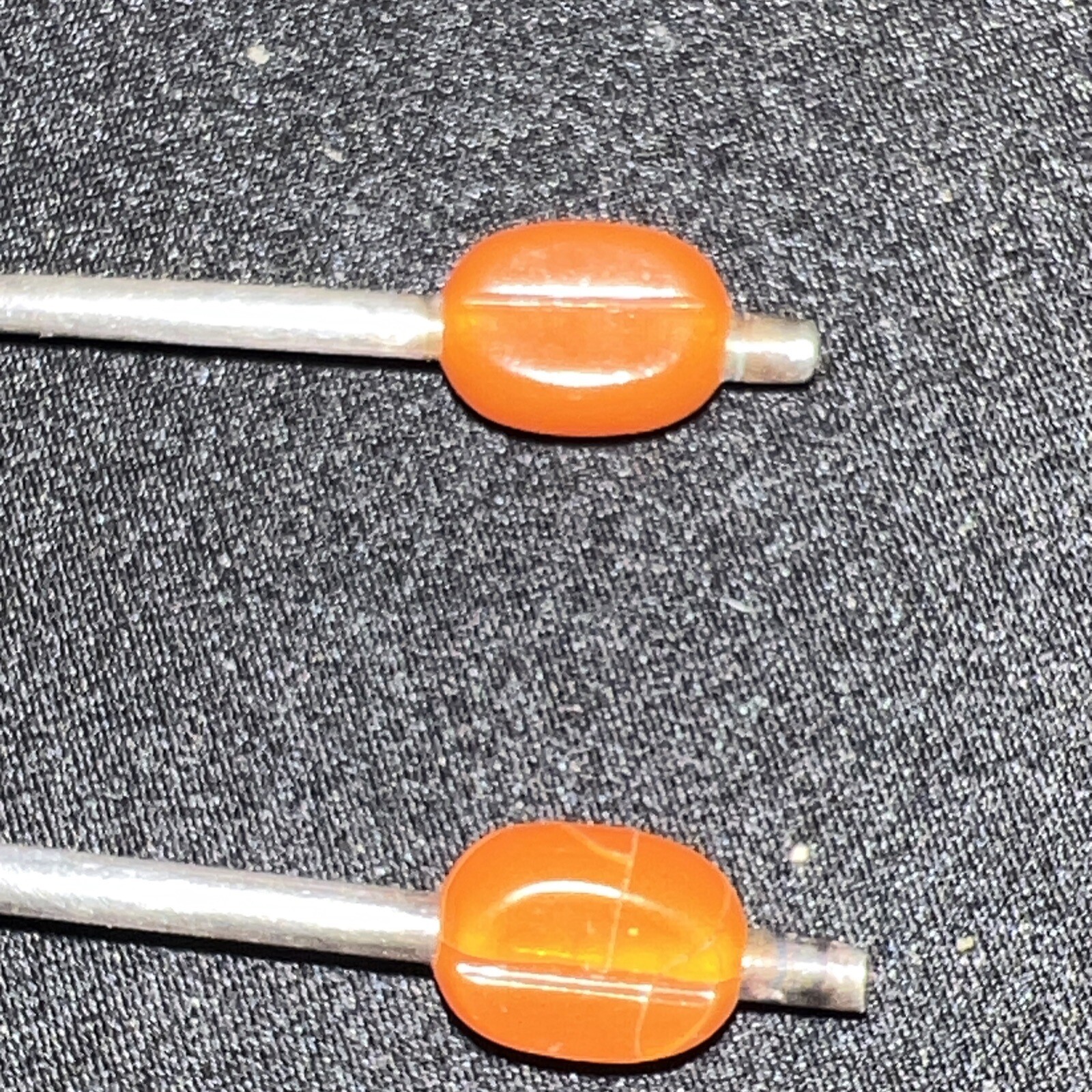 2 coffee bean teaspoons With Orange Beans