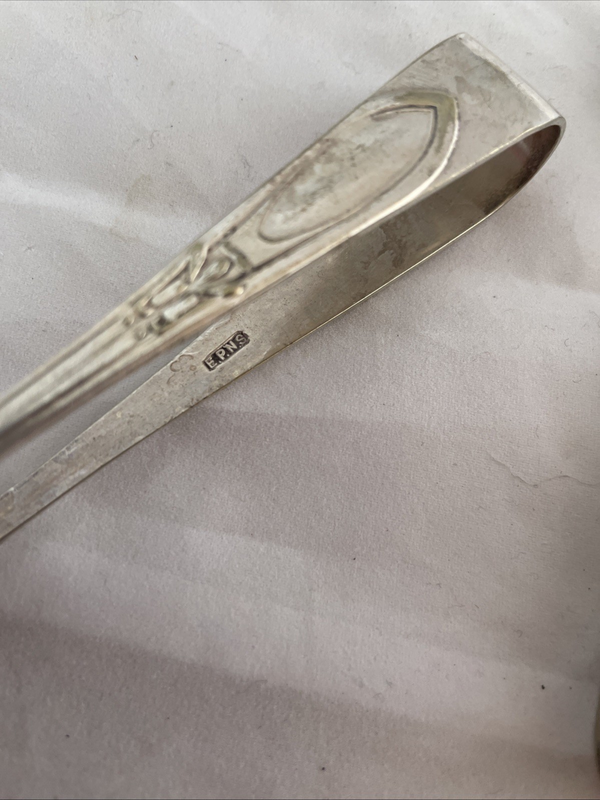 silver plated sugar tongs X 2. Art Deco.