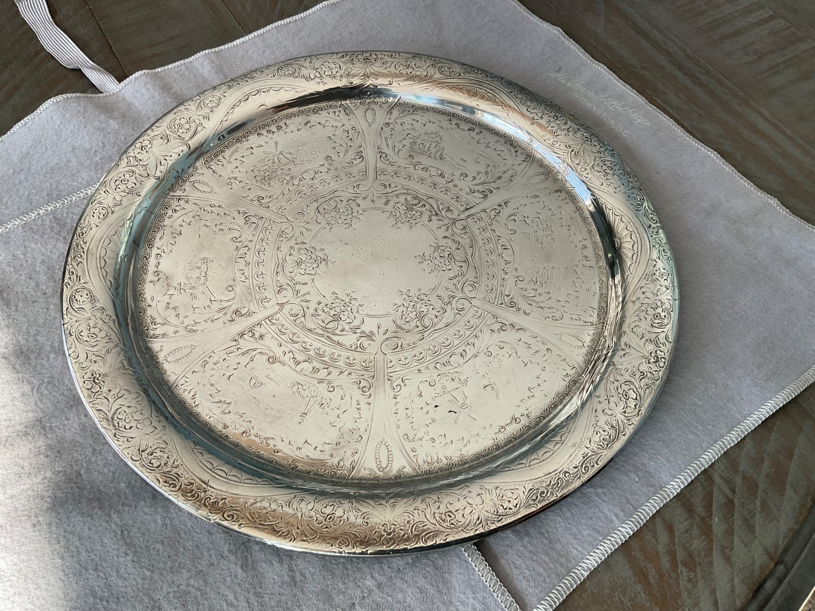 Antique 10” Dutch scene heavy circular Silver Plate Serving Platter 5754/10