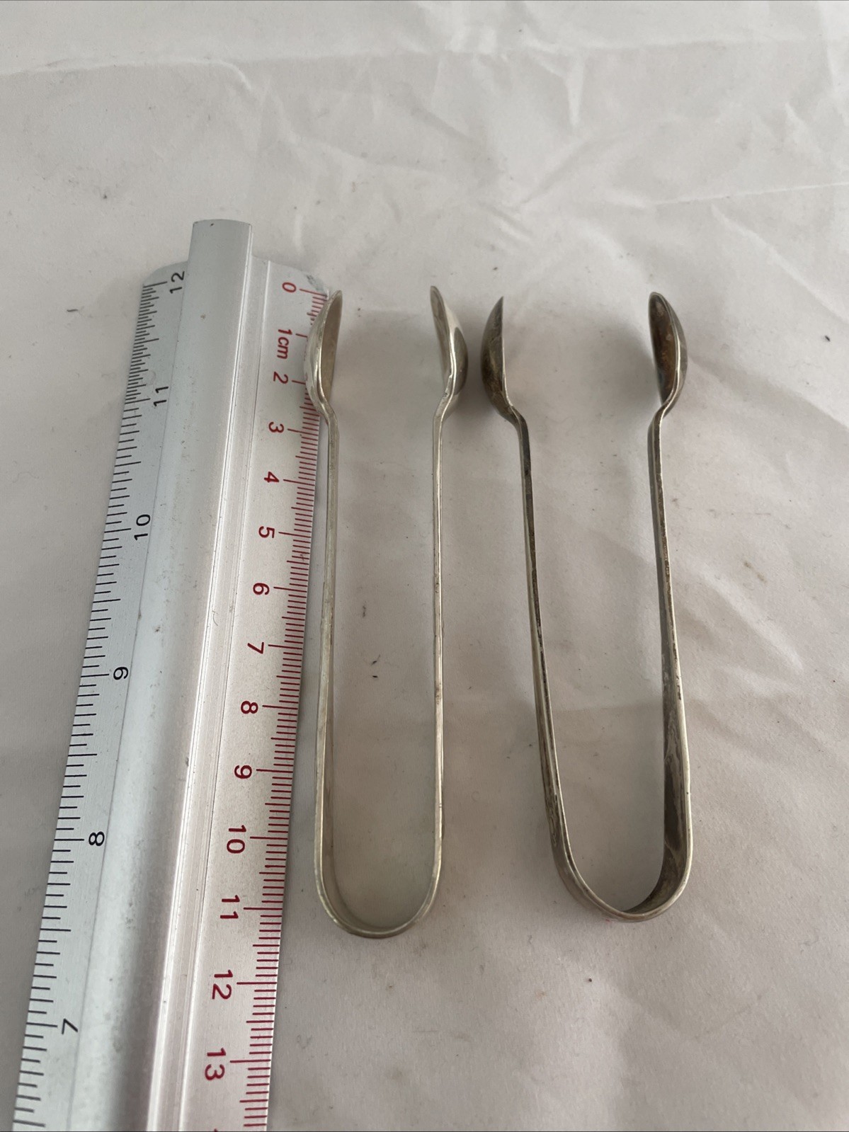 silver plated sugar tongs X 2. Art Deco.