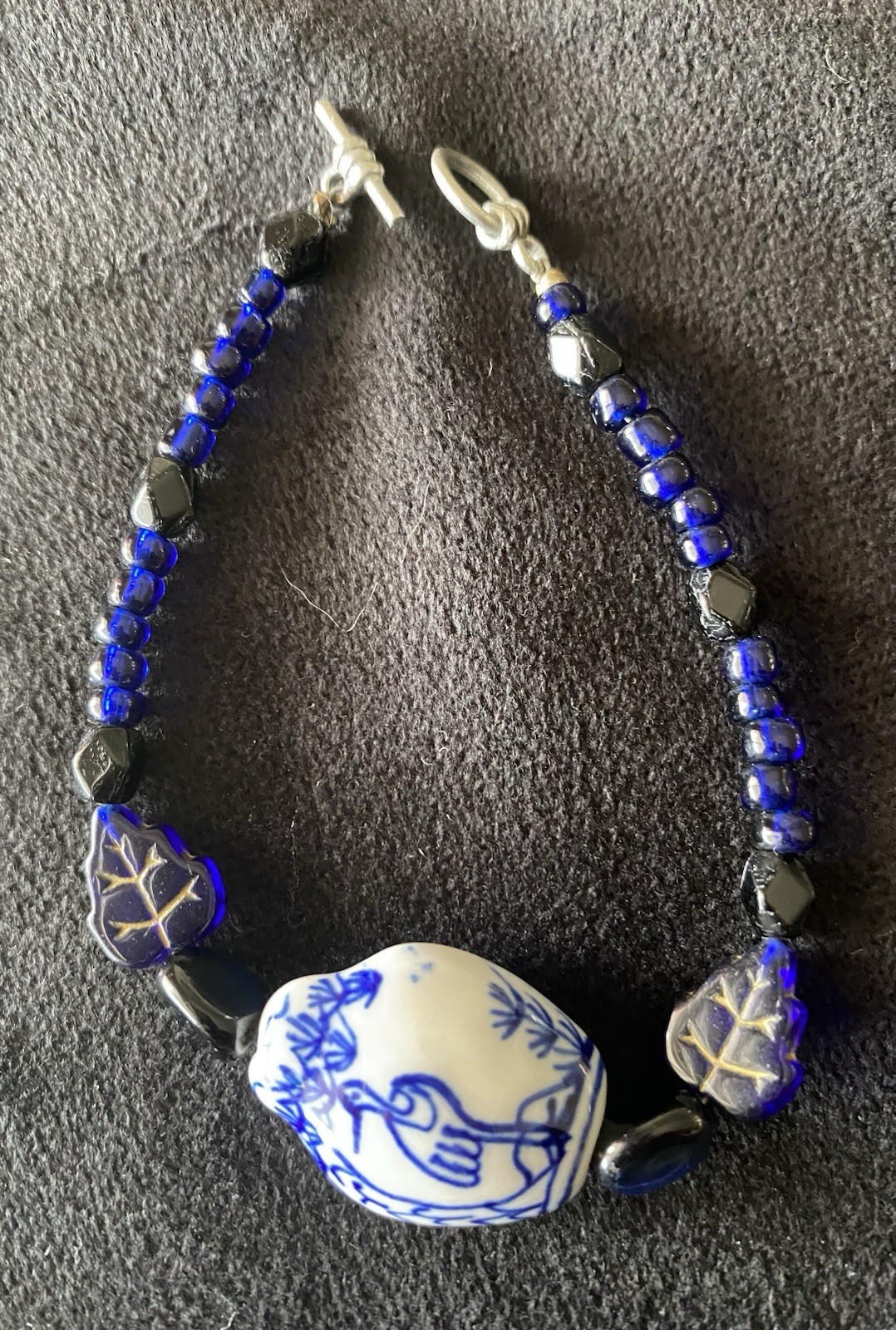 Asian Hand Painted Stork Bead W/ Translucent Dark Blue Accent Beads Toggle Close