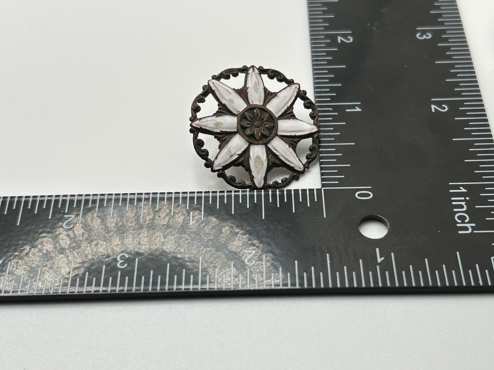 ANTIQUE METAL SHANK FLORAL BUTTON WITH ENAMEL ACCENTS