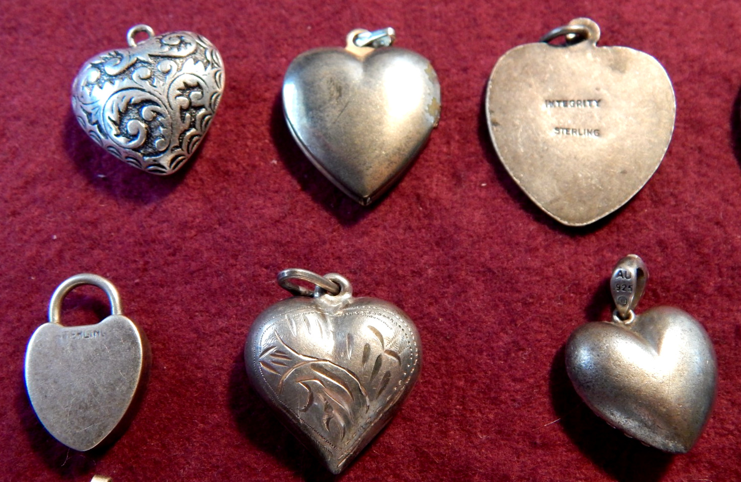 LOT OF 25 STERLING 925 SILVER CHARMS,62.8 GRAMS, ASSORTMENT OF HEARTS &LOCKETTS
